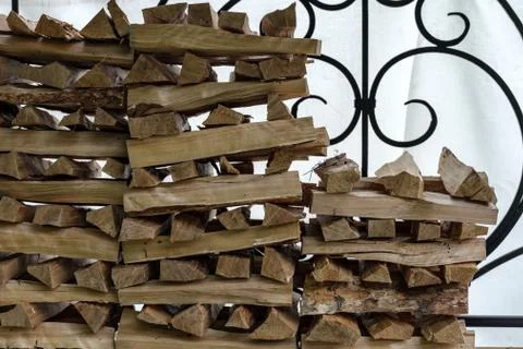 The firewood is stacked. Stock Photos