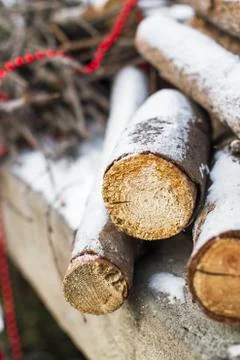 Firewood under the snow Stock Photos
