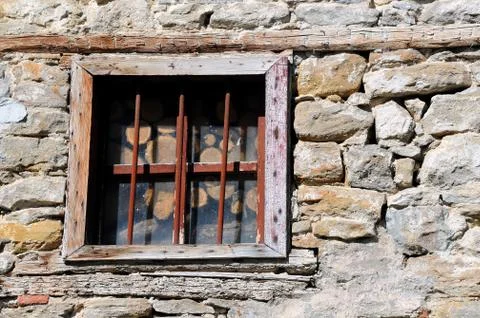Firewood in the window Stock Photos
