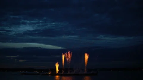 Firework from boat on evening sky Stock Footage 91100763