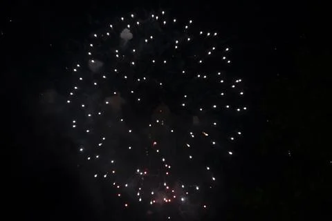 Firework bursting in smoke Stock Photos