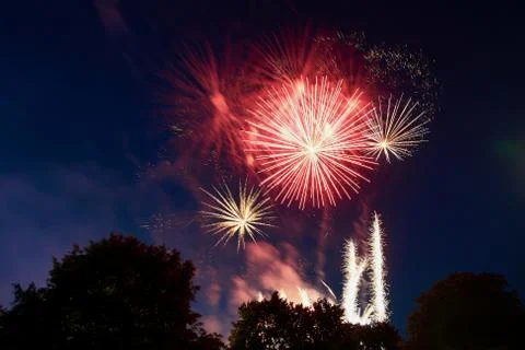 Firework celebration red, orange and yellow lights Stock Photos