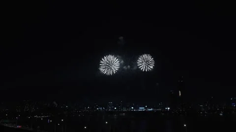 Firework display in Night City Skyline During Seoul International Firework Stock Footage 288181824