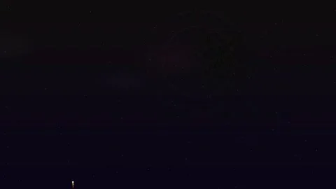 Firework display over the city skyline at night with vibrant colors and dyn.. Stock Footage 325788113