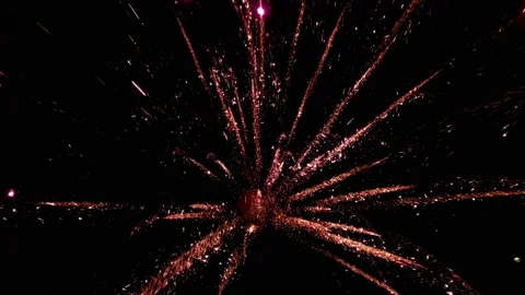 Firework display in slow motion. Bokeh Particles and Sparks On Night Sky Stock Footage 97941611