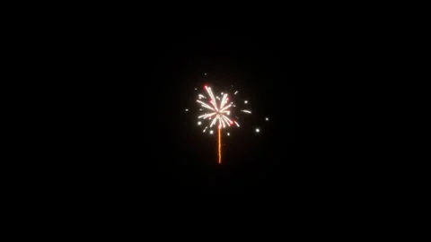 Firework explodes in dark sky, bright sparks light up the night scene. 库存影片 313555988
