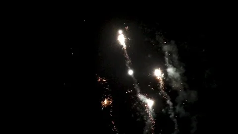 Firework exploding near moon Stock Footage