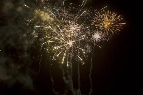 Firework explosion from beautiful stars, splashes, sparks and bright lines .. Stock Photos