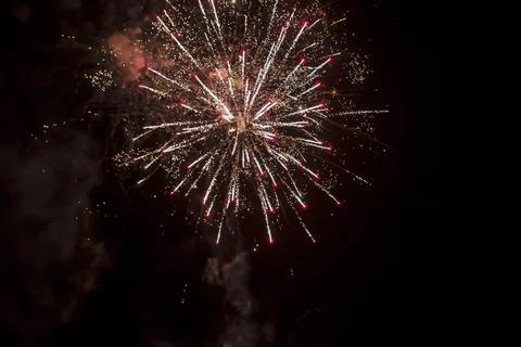 Firework explosion from beautiful stars, splashes, sparks and bright lines .. Stock Photos