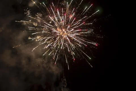 Firework explosion from beautiful stars, splashes, sparks and bright lines .. Stock Photos