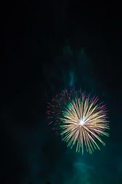 Firework explosion on dark sky Stock Photos