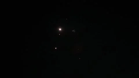 Firework explosion pattern captured in clear dark sky Stock Footage 321111597