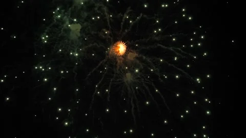 Firework explosions illuminate darkness with sparkling stars fountains Stock Footage 255192935