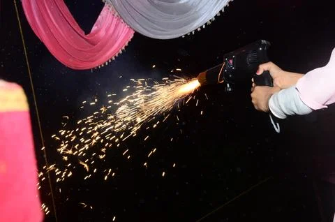 Firework with gun in night at the occation of festivals Stock Photos