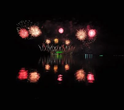 Firework at night. Stock Photos