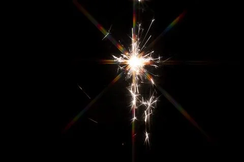 Firework sparkle exposed texture in celebrating night on black background Stock Photos
