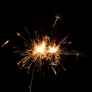 Firework sparkler burning, Bengal fire on black background, burning sparklers Stock Photos