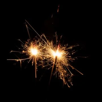 Firework sparkler burning, Bengal fire on black background, burning sparklers Stock Photos
