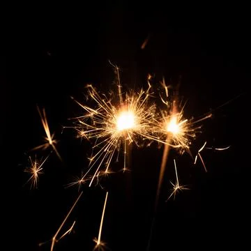 Firework sparkler burning, Bengal fire on black background, burning sparklers Stock Photos