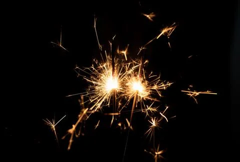 Firework sparkler burning, Bengal fire on black background, burning sparklers Stock Photos