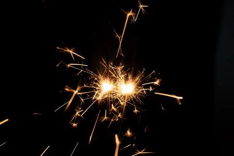 Firework sparkler burning, Bengal fire on black background, burning sparklers Stock Photos