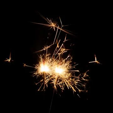 Firework sparkler burning, Bengal fire on black background, burning sparklers Stock Photos