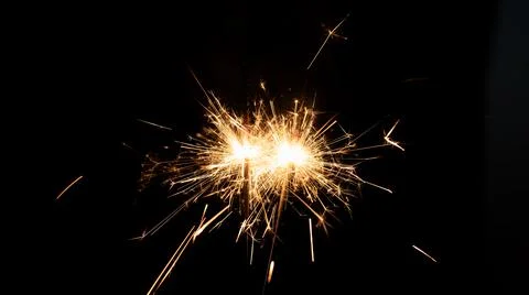 Firework sparkler burning, Bengal fire on black background, burning sparklers Stock Photos