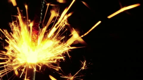 Firework sparkler burning on black background, congratulation greeting  party Stock Footage 57444088