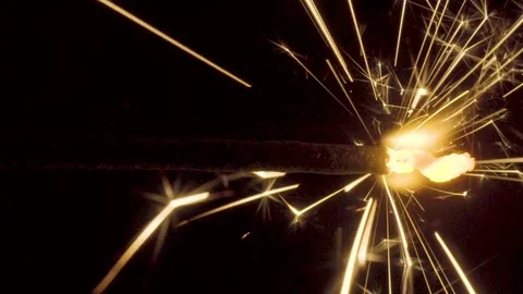 Firework sparkler burning on black background Stock Footage 85047740