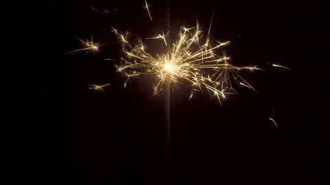 Firework sparkler burning on black background Stock Footage 85460921