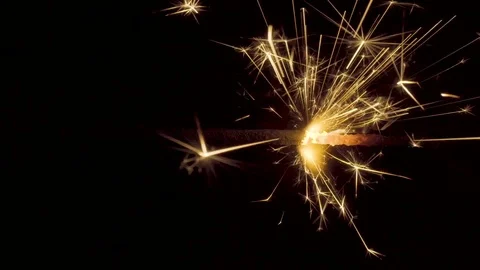 Firework sparkler burning on black background Stock Footage 85462026