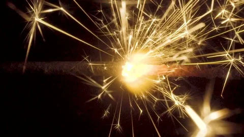 Firework sparkler burning on black background Stock Footage 85462432