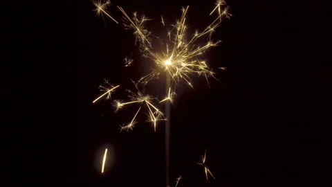 Firework sparkler burning on black background Stock Footage 86195827