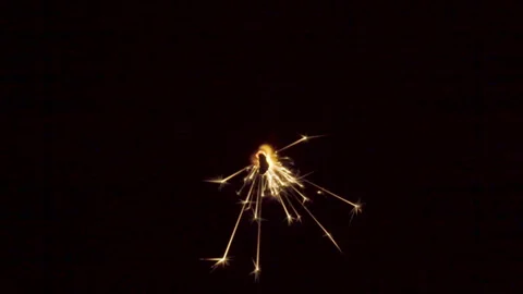 Firework sparkler burning on black background Stock Footage 86196952
