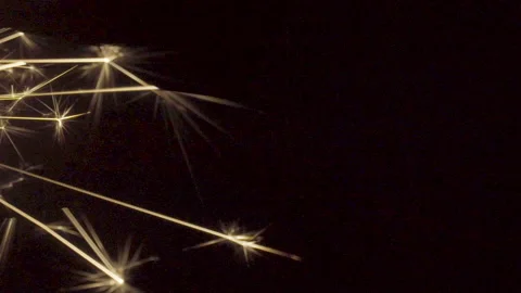 Firework sparkler burning on black background Stock Footage 86209925