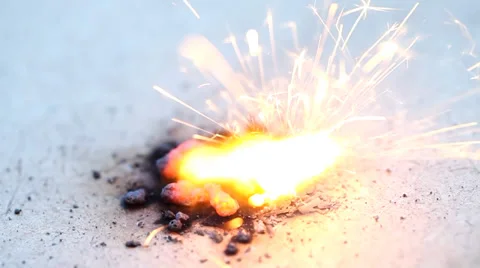 Firework sparkler burning in macro shot Видео 35472704