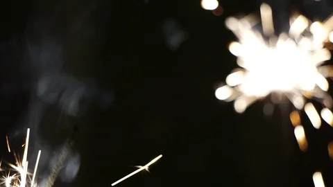 Firework sparkler burning in macro shot Видео 71138795
