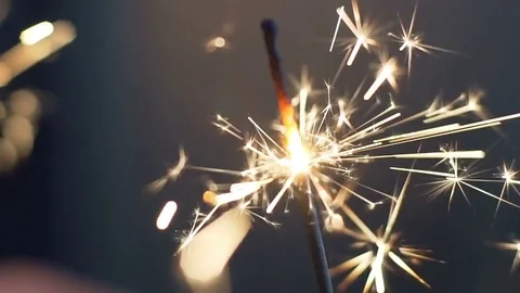 Firework sparkler burning in macro shot Stock Footage 83355558