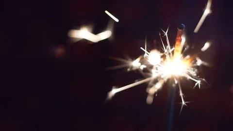 Firework sparkler burning in macro shot Stock Footage 83355705