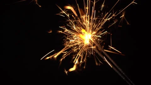 Firework sparklers lighting at new year party, close up. Stock Footage
