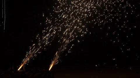 Firework torches in night Light spray in black background Slow motion footage Stock Footage 100182640