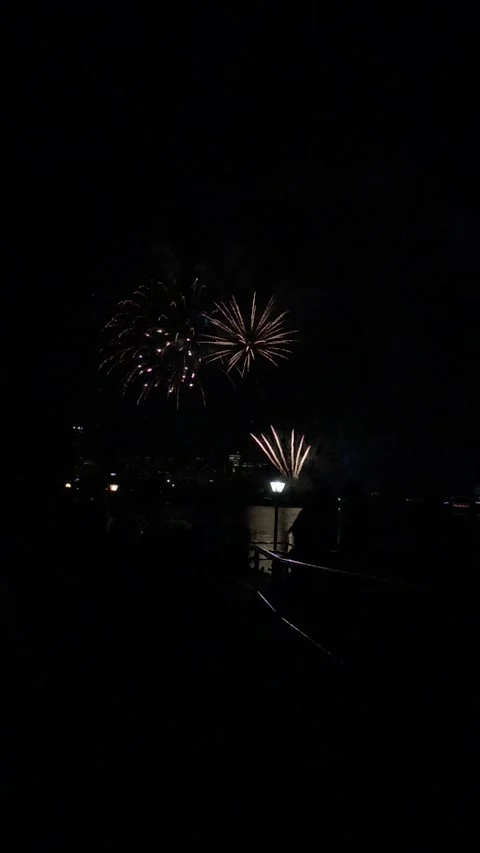 Fireworks across a river Stock Footage 162819956