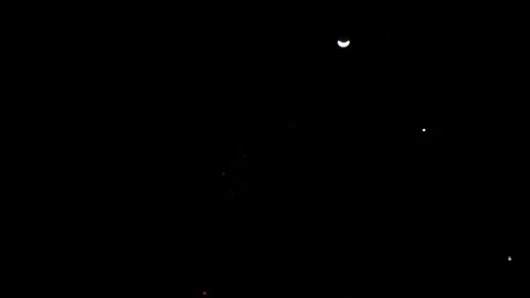Fireworks and crescent moon Stock Footage 77980464