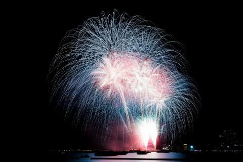 Fireworks on beach at sky. Stock Photos
