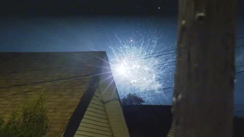 Fireworks Behind House Stock Footage 210762901