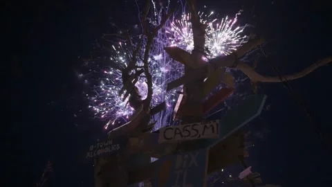 Fireworks behind sign Stock Footage 157240223
