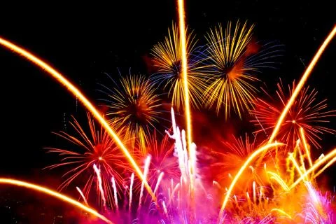 Fireworks on the black sky background Stock Photos