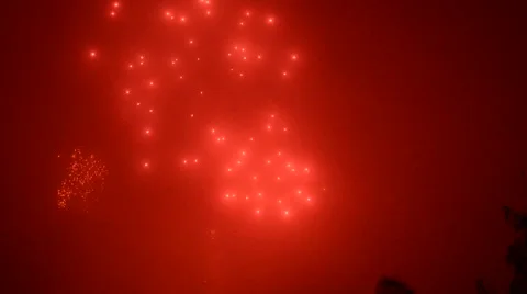 Fireworks cracking against a black sky in the night Stock Footage 49737952
