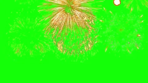Fireworks display exploding against vibrant green night sky for celebration Stock Footage 345627858