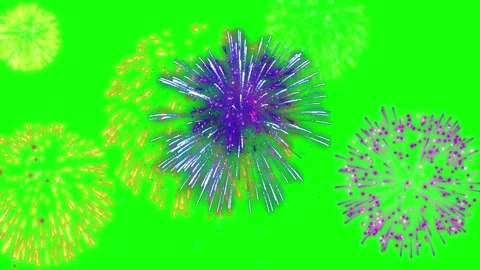 Fireworks display exploding against vibrant green night sky with bright sparks Stock Footage 345864752